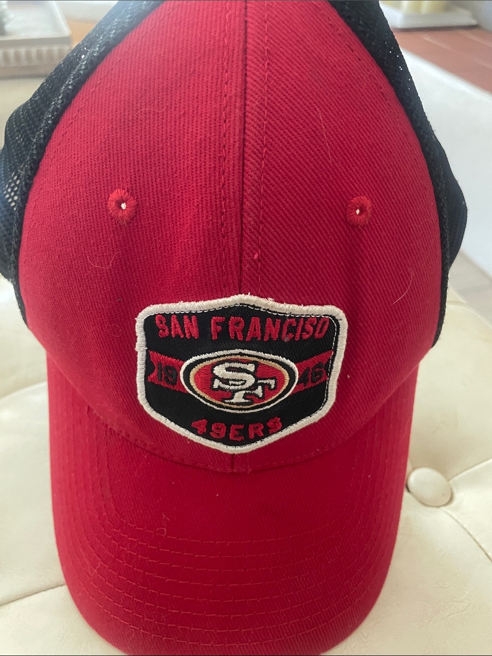 NFL Black Mesh Trucker Hat with NFL Logo Tag
